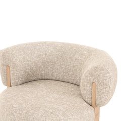 Sleek swivel armchair upholstered in premium fabric, combining functionality with modern elegance for home interiors.