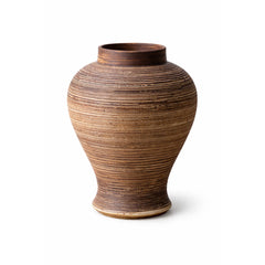 Brown ceramic vase with textured surface on a white background