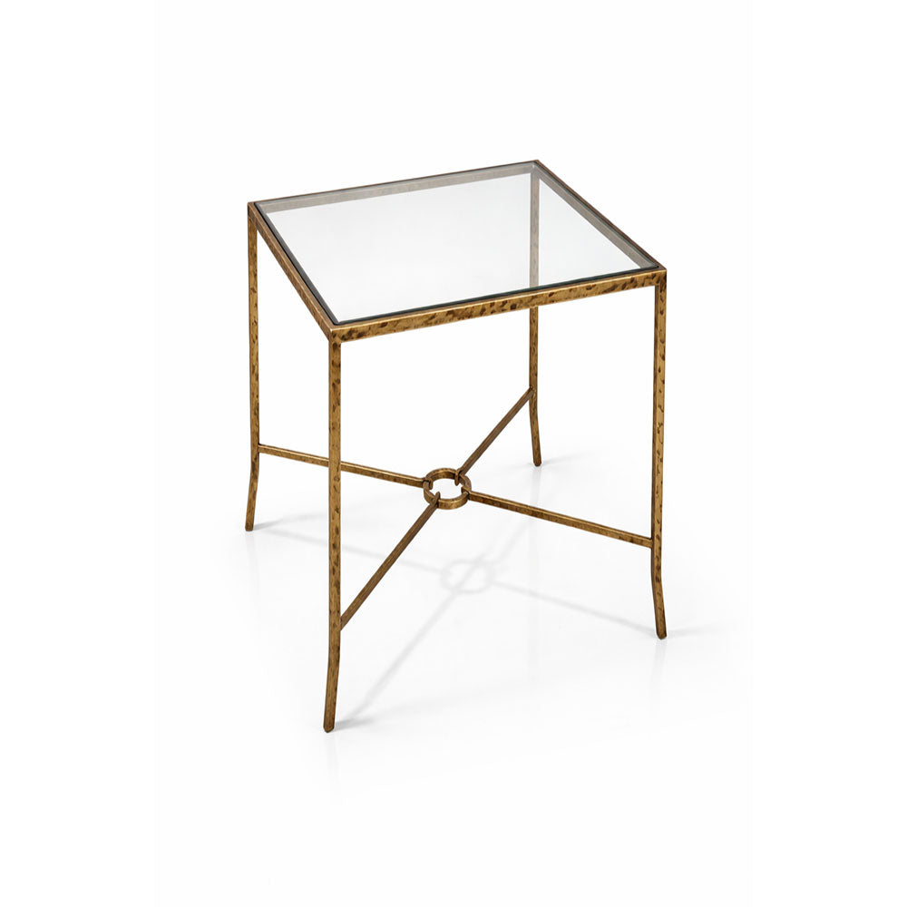 Modern accent table featuring clear tempered glass surface and artisan-forged metal legs.