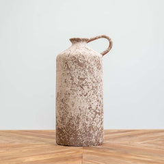 Tall narrow ceramic urn with an aged, relic-style finish, metallic accents, and a small loop handle, ideal as a decorative piece for indoor or outdoor undercover spaces.