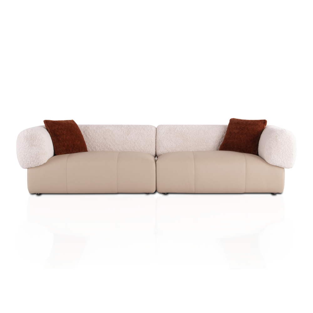 Beige sofa with brown cushions on a white background