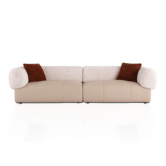 Beige sofa with brown cushions on a white background