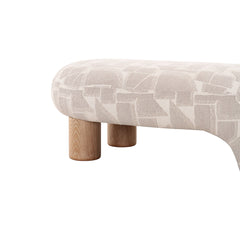 Modern decorative bench with distinctive form, patterned upholstery, and natural timber accents, ideal for stylish living rooms or hallways.