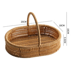 Small shallow oval plastic rattan basket with a sturdy handle, ideal for toiletries, accessories, or small decorative items.
