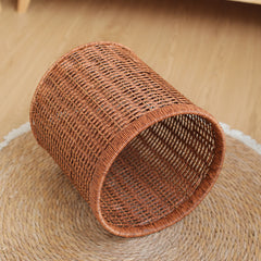 Sophisticated home storage basket in walnut color, ideal for storing accessories or decorative items.