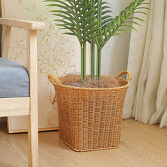 Durable and stylish plastic rattan basket with convex shape and handles, combining functionality with luxury home organization.