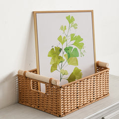 Sophisticated home storage basket with solid wood handles, ideal for storing toiletries, accessories, or decorative items.