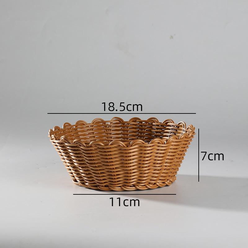 Sophisticated bowl-style storage basket with scallop border detailing, blending functionality and timeless style.