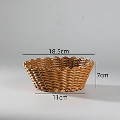 Sophisticated bowl-style storage basket with scallop border detailing, blending functionality and timeless style.