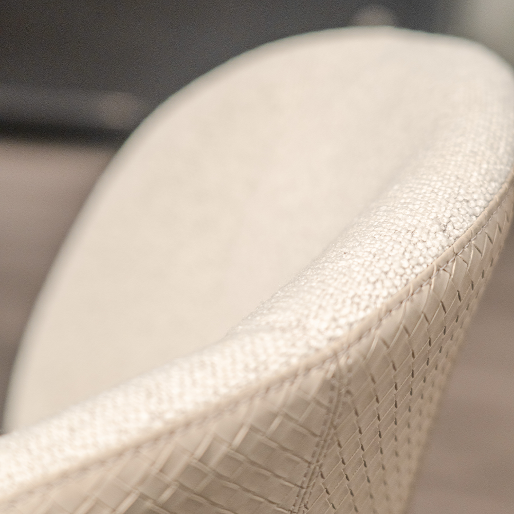 Comfortable Sorrento Dining Chair with curved back design, high-density foam seat, and contemporary cotton linen and leather finish.