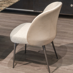 Contemporary Sorrento Dining Chair featuring stylish cotton linen and microfiber leather upholstery with durable carbon steel legs.
