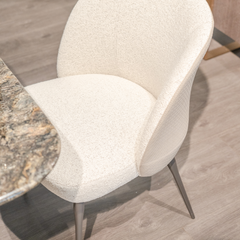 Sorrento Dining Chair upholstered in high-quality cotton linen and microfiber leather, offering a luxurious and supportive seating experience.