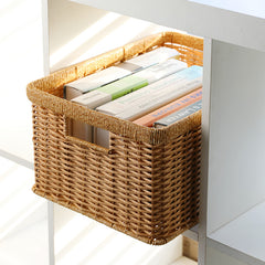 Stylish medium-depth rectangular basket with sturdy handles, blending practicality with timeless design.