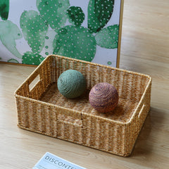 Stylish rectangular storage box made from durable plastic rattan, suitable for modern, traditional, or contemporary interiors.