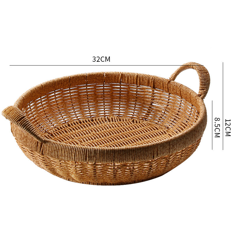 Stylish round bowl basket crafted from durable plastic rattan, featuring a thick border and handles for convenience and elegance.