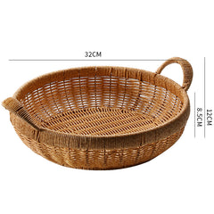 Stylish round bowl basket crafted from durable plastic rattan, featuring a thick border and handles for convenience and elegance.