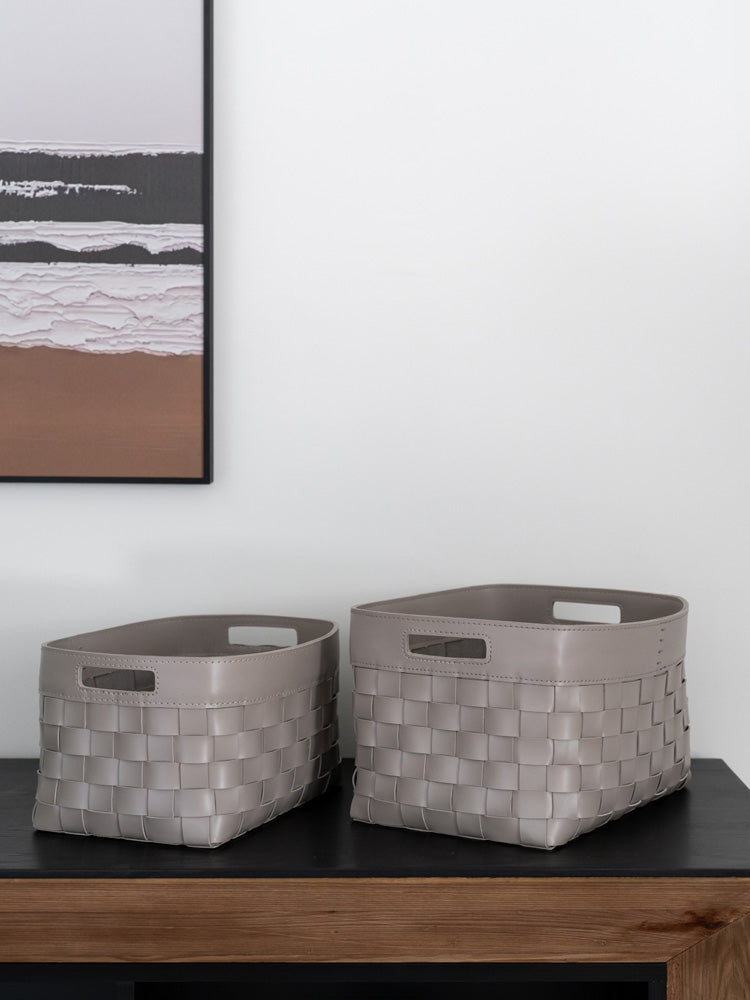 Premium hand-woven bridle leather storage box available in small and large sizes, offering a practical and elegant solution for organizing home essentials and decorative items.