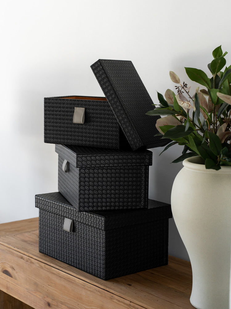 Sleek contemporary storage box with PU leather exterior and soft velvet interior, perfect for organizing valuables, jewelry, and everyday items with style and sophistication