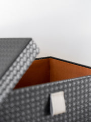 Elegant small storage box made from premium PU leather with a soft velvet interior, perfect for organizing jewelry, keepsakes, and valuables in modern and contemporary interiors.