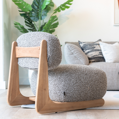 Contemporary accent chair combining plush cotton linen seating with an Elm wood frame for elegant home d??cor.