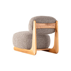 Modern luxury armchair with soft cotton linen fabric and sleek curved design, perfect for living rooms or lounges.