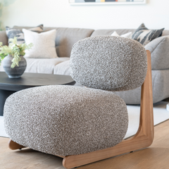 Modern statement accent chair in high-quality cotton linen with sculptural Elm wood frame for stylish interiors.