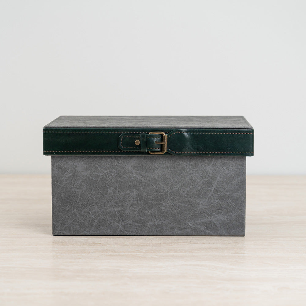 Talon storage box featuring a dark grey body and smooth dark green lid for modern organization.