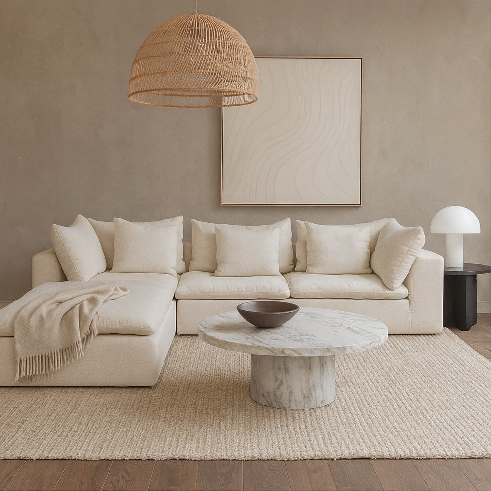 The Kali 4-Seater Sofa featuring a refined minimalist design with structured upholstery, soft texture, and timeless elegance for modern interiors.