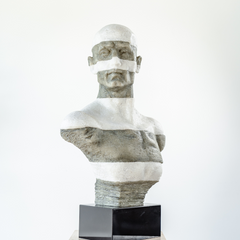 Artistic seated man sculpture capturing emotional depth and texture, ideal for home or office décor.

