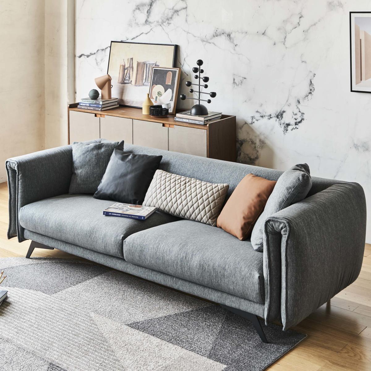 Designer Tindra 3-Seater Sofa in bold blue cotton-linen fabric with sleek brushed titanium legs, blending classic design with modern elegance.