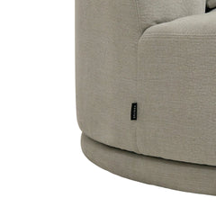 Detail shot of the Umea Sofa’s premium textured woven upholstery, showing the soft tactile surface and fine craftsmanship of the fabric.