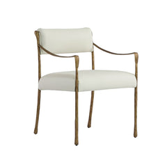 Luxurious armchair in soft white fabric with solid forged golden iron frame. A refined statement piece combining comfort, elegance, and timeless artistry.