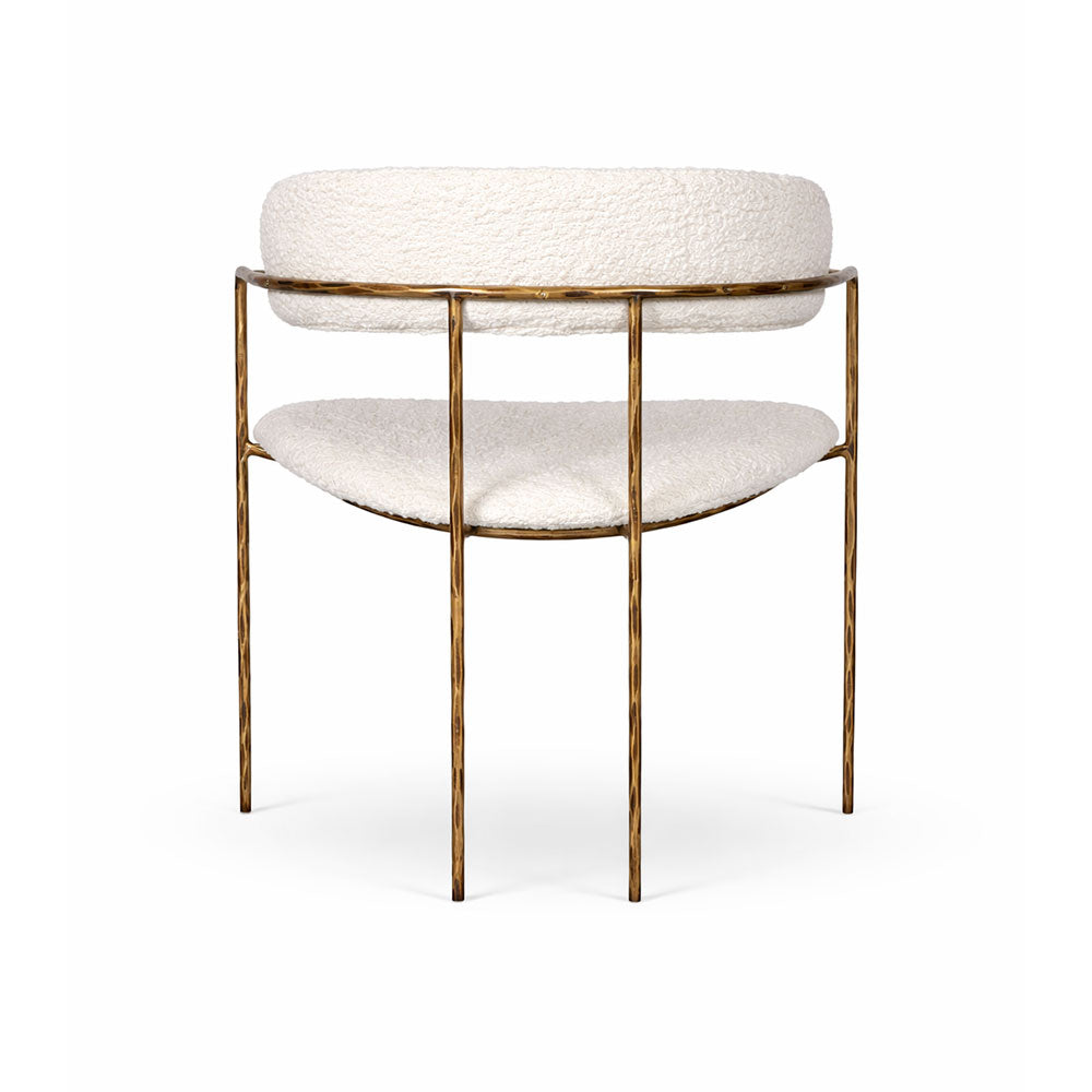 Comfortable and stylish dining chair with soft fabric upholstery and refined modern silhouette, ideal for modern homes and open-plan dining areas.