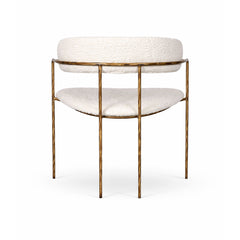 Comfortable and stylish dining chair with soft fabric upholstery and refined modern silhouette, ideal for modern homes and open-plan dining areas.