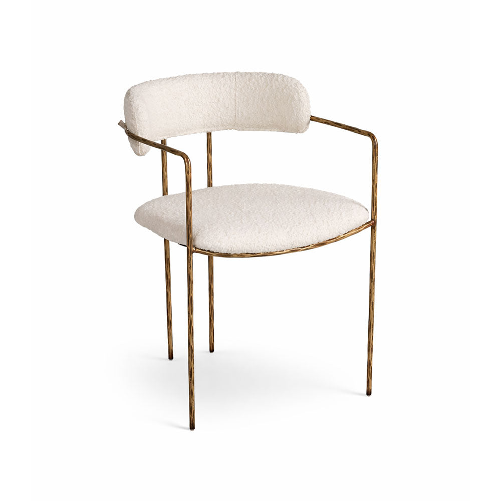 Elegant upholstered dining chair with clean lines and modern design, perfect for contemporary interiors and designer dining spaces.