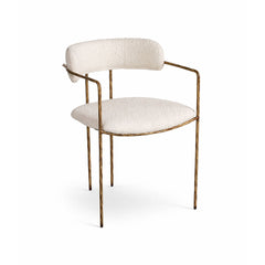 Elegant upholstered dining chair with clean lines and modern design, perfect for contemporary interiors and designer dining spaces.
