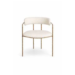 Contemporary dining chair upholstered in premium fabric, featuring a sleek silhouette and supportive design for stylish dining rooms and kitchens.