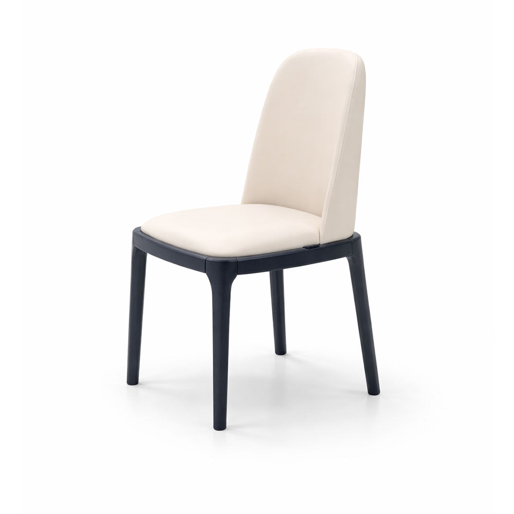 Elegant cream leather dining chair with traditional silhouette and dark timber legs, perfect for contemporary and classic dining rooms.