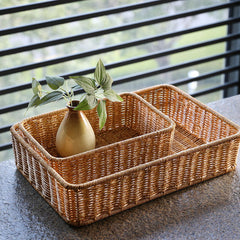 Versatile rectangular rattan-style storage basket, lightweight yet sturdy, suitable for bathroom, kitchen, or living room organization.