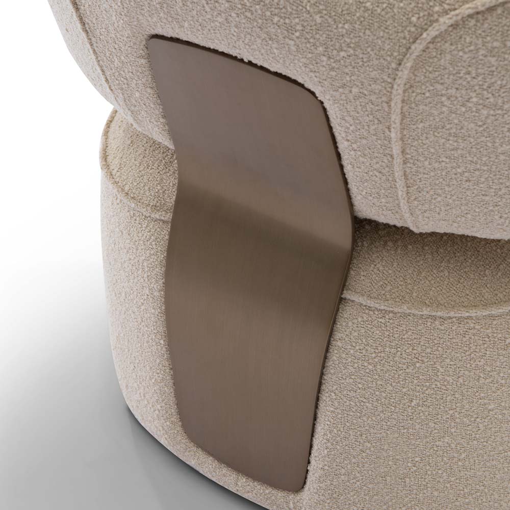 Close-up of brushed bronze detailing on Yeti Accent Chair