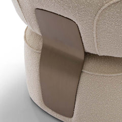 Close-up of brushed bronze detailing on Yeti Accent Chair