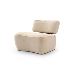 Side angle of Yeti chair highlighting metallic embellishments