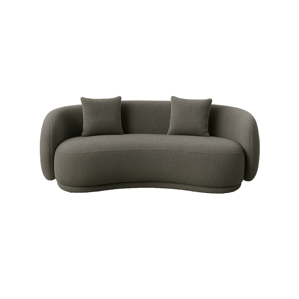 The Zoi 2-Seater Sofa in grey textured bouclé upholstery, showcasing its sculptural curves, minimalist form, and plush cushions in a modern interior setting.