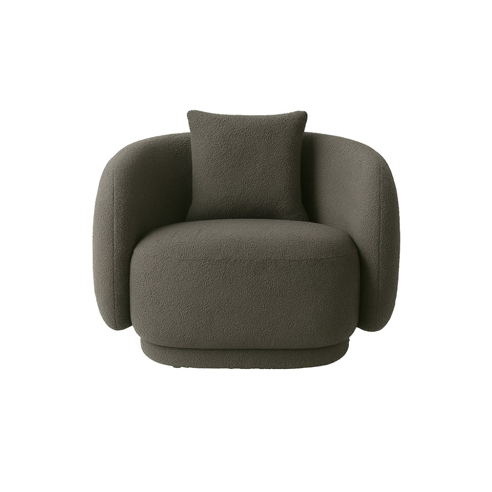 The Zoi Swivel Chair in soft grey textured bouclé, showcasing its rounded silhouette, plush cushioning, and contemporary swivel design in a neutral interior space.