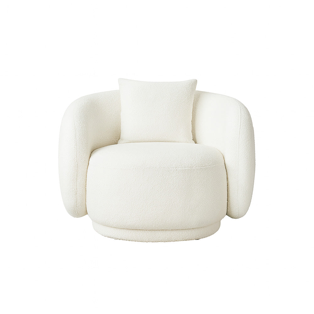 The Zoi Swivel Chair in white bouclé fabric, featuring a sculptural curved backrest and smooth 360-degree swivel base, styled in a modern minimalist living room.