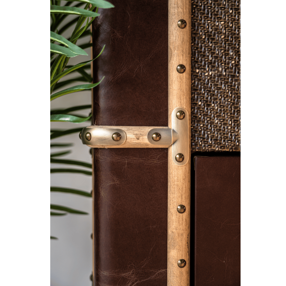 Antique style tallboy trunk chest featuring leather-wrapped frame, studded metal details, and heritage craftsmanship