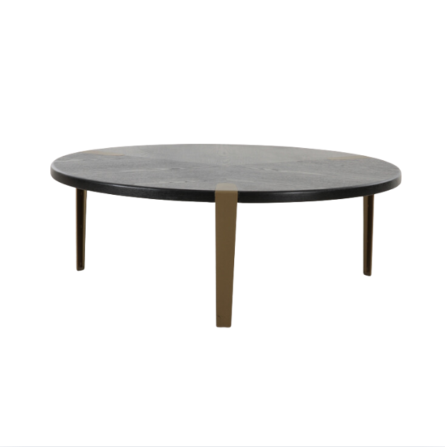 Bohne Coffee Table with ash veneer top and bronze legs styled in a modern living room setting