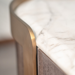 Contemporary sideboard combining dark oak and marble for a sleek, modern home aesthetic.