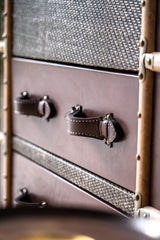 Designer vintage tallboy Hereford cabinet with leather and metal frame, antique-inspired storage furniture