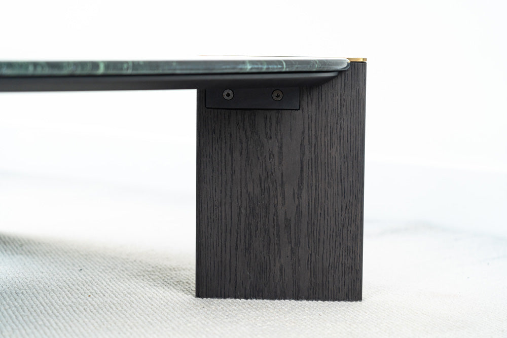Exclusive Ponze designer coffee table with Verde Alpi green marble surface and refined detailing, luxury centrepiece